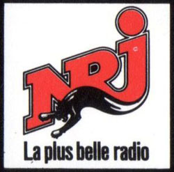 Ancien logo NRJ slogan annees 80 La Plus Belle des Radios partenaire concerts Serge Gainsbourg billet spectacle collection 1988
